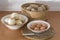 Basic foods on the kitchen table, eggs, onions and potatoes