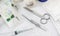 Basic kit for medical assistance in an emergency or emergency, with vials, scissors and tweezers, gauze, compressor, syringe,