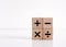 Basic mathematical operations symbols. Plus, minus, multiply and divide symbols on wooden cubes on white background