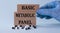 BASIC METABOLIC PANEL - words on wooden blocks against the background of a hand in a medical blue glove