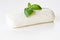 Basil leaf on mozzarella