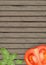 Basil leaves on wooden background with tomatoes. Tomato banner o