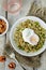 Basil nuts pesto quinoa with walnuts, parsley and poached egg