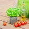 Basil, olive oil and tomatoes, summer italian mediterranean food concept