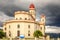 Basilica in honour of Our Lady of Charity with black thunder clouds above, El Cobre, Santiago de Cuba, Cuba