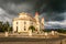 Basilica in honour of Our Lady of Charity, El Cobre with black thunder clouds above, Santiago de Cuba, Cuba