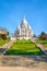 The basilica of the Sacred Heart of Paris and the stairways in the Louise Michel park