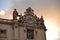 Basilica of Saint Peter at Vatican City. View of the Right Angle adorned by some statues of saints and a large clock.