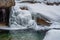 The Basin in Franconia Notch State Park during winter . New Hampshire mountains. USA