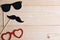 Basis for banner with mustache props and glasses for photos. Frame for text with paper mustache and glasses. Frame for children`s