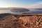 Baska - Panoramic sunrise view of deserted island Prvic seen from idyllic hiking trail near coastal town Baska