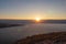 Baska - Panoramic view of sunrise over karst mountains along idyllic hiking trail near coastal town Baska, Krk Otok