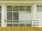 Basket ball hoop on the wall. The school sporting hall