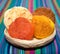 Basket with a bunch of typical mexican coconut candies honey cocada traditional mexican flag carpet background isolated colors