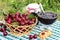 Basket of cherries, cherry jam with biscuit, cherry jam jar