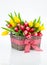 Basket with colorful bouquets of tulips