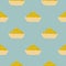 Basket with cream silhouettes seamless doodle pattern. Tasty ocher cake ornament on blue background. Food artwork