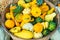 Basket of decorative gourds on display