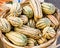 Basket of delicata squash at the market