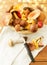 Basket of different edible mushrooms and knife