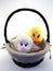 Basket with duckling and lamb sitting inside