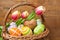 Basket with eggs and tulips