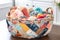 basket filled with colorful fabrics and sewing supplies