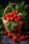 Basket filled with ripe, red strawberries topped with fresh green leaves