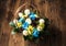 Basket flowers on a wooden background