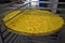 Basket with flowers of yellow chrysanthemums preparing for the drying.