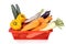 Basket of fresh assorted vegetables carrots, radish, capsicum, tomato, brinjal, cucumber