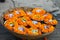 A basket full of flower pots and candles in Varanasi, India