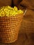 Basket full of yellow primrose blossoms