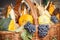 Basket with harvest decorations made of decorative pumpkins and fruits