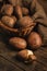 Basket with potatoes on a wooden table. Rural still life - peeling cooking potatoes