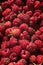 Basket of raspberries (Rubus idaeus), background