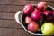 Basket in red apples, basket full of apples, apples pictures on authentic wood floor,