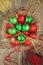 In a basket red and green Christmas balls and space effect