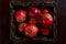 Basket of red pomegranates