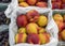 Basket of Ripe juicy nectarines at a fruit stand for sale