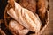 Basket with several loaves of wheat and rye bread