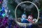 Basket with toy under fir tree in Cristmas