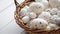 Basket of white dotted Easter eggs in brown wicker basket