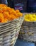 Basket of yellow and orange marigolds