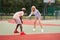 Basketball afro american man friends training caucasian woman Multiracial friendship afro guy instructor teaching female