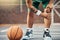 Basketball, athlete and knee injury on the basketball court during outdoor game or training. Man in with leg pain after