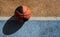 Basketball ball in a colorful street basketball court. Copy space