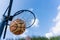 Basketball ball enters the basket in a swish shoot