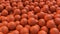 Basketball balls background. Many orange basketball balls with realistic dimple texture lying in a pile