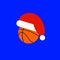 Basketball in cap Santa Claus. Sports New Year and Christmas